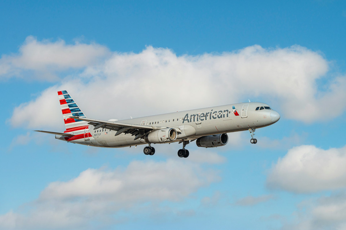An American Airlines Airbus of the A320 family in flight. This is a stock photograph used for context only: it is NOT the aircraft involved, and no photograph, video or radar image of the reported object exists. The entire primary record of this case is one recorded radio transmission.
