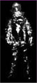 One of the four Polaroid photographs Falkville police chief Jeff Greenhaw said he took on the night of 17 October 1973, showing a tall, wrinkled, brilliantly reflective humanoid figure standing in a dark field. This is a real instant photograph from the case, not a recreation or render; the original prints were stolen from Greenhaw's home around 1983 and never recovered, so surviving copies derive from the press and research scans made before then.