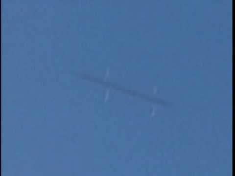A frame from the raw FOX 23 News (WXXA-TV) footage shot by videographer Brandon Mowry at Albany International Airport on 20 October 2002, the actual broadcast video at the center of the case, not a recreation or CGI. The silver, finned object the case turns on appears only for about seven frames at high speed.