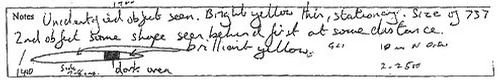 Captain Ray Bowyer's own pilot logbook Notes entry, written on the day of the flight, 23 April 2007. In his hand it reads: "Unclassified objects seen. Bright yellow thin, stationary. Size of 737. 2nd object same shape seen behind 1st at some distance. brilliant yellow," with his small sketch of the object showing the dark band, and the figures "10 m N Alds" and the time. This is the witness's own contemporaneous handwritten record and sketch, not a recreation or illustration.