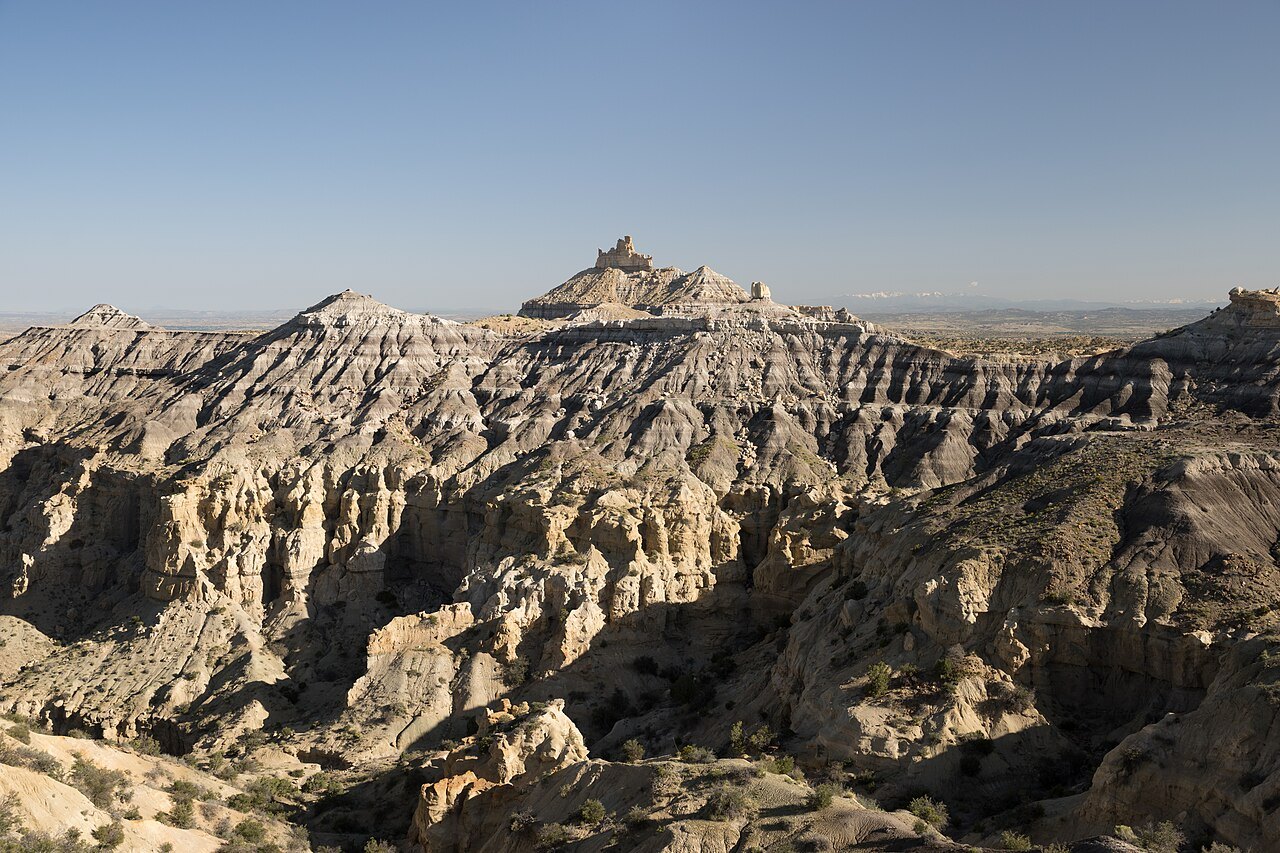 The Angel Peak badlands in San Juan County, New Mexico, the high-desert mesa country near Aztec where the 1948 crash was claimed. No crash debris, body, or site was ever produced, so this is a locator of the terrain, not the alleged site.