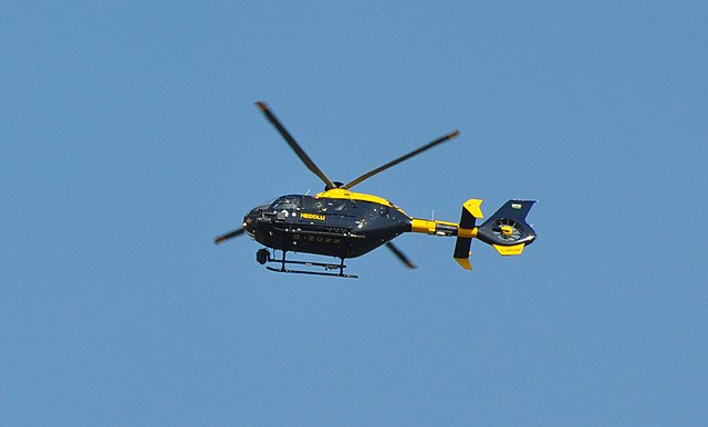 The actual South Wales Police helicopter involved in the encounter: Eurocopter EC135, registration G-WONN, of the South and East Wales Air Support Unit, photographed in the Vale of Glamorgan on 8 August 2009. This is a real photograph of the aircraft type and tail number that flew the St Athan unit at the time, not a depiction of the object reported. No image of the reported object exists; the crew said it did not register on the helicopter's cameras.