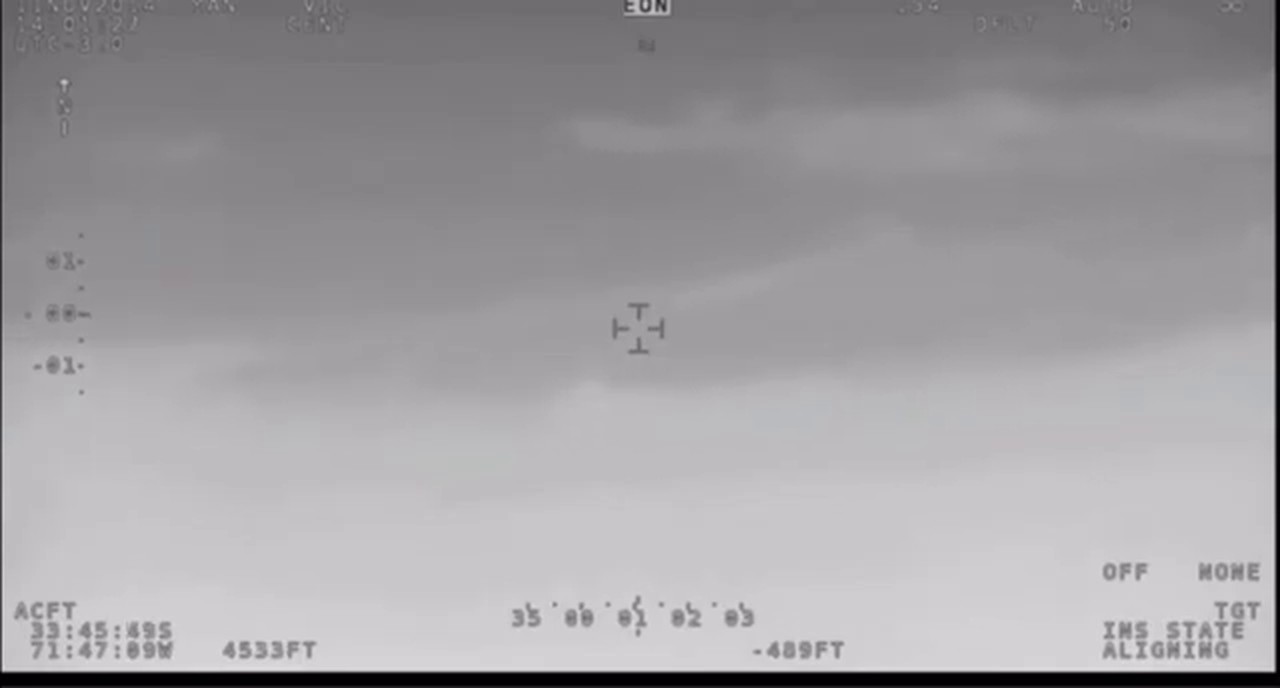The same scene moments earlier in the visible light camera, marked EOW at the top of the display. The switching between the thermal and visible cameras during the recording is one of the details the crew account and the instrument readout agree on.