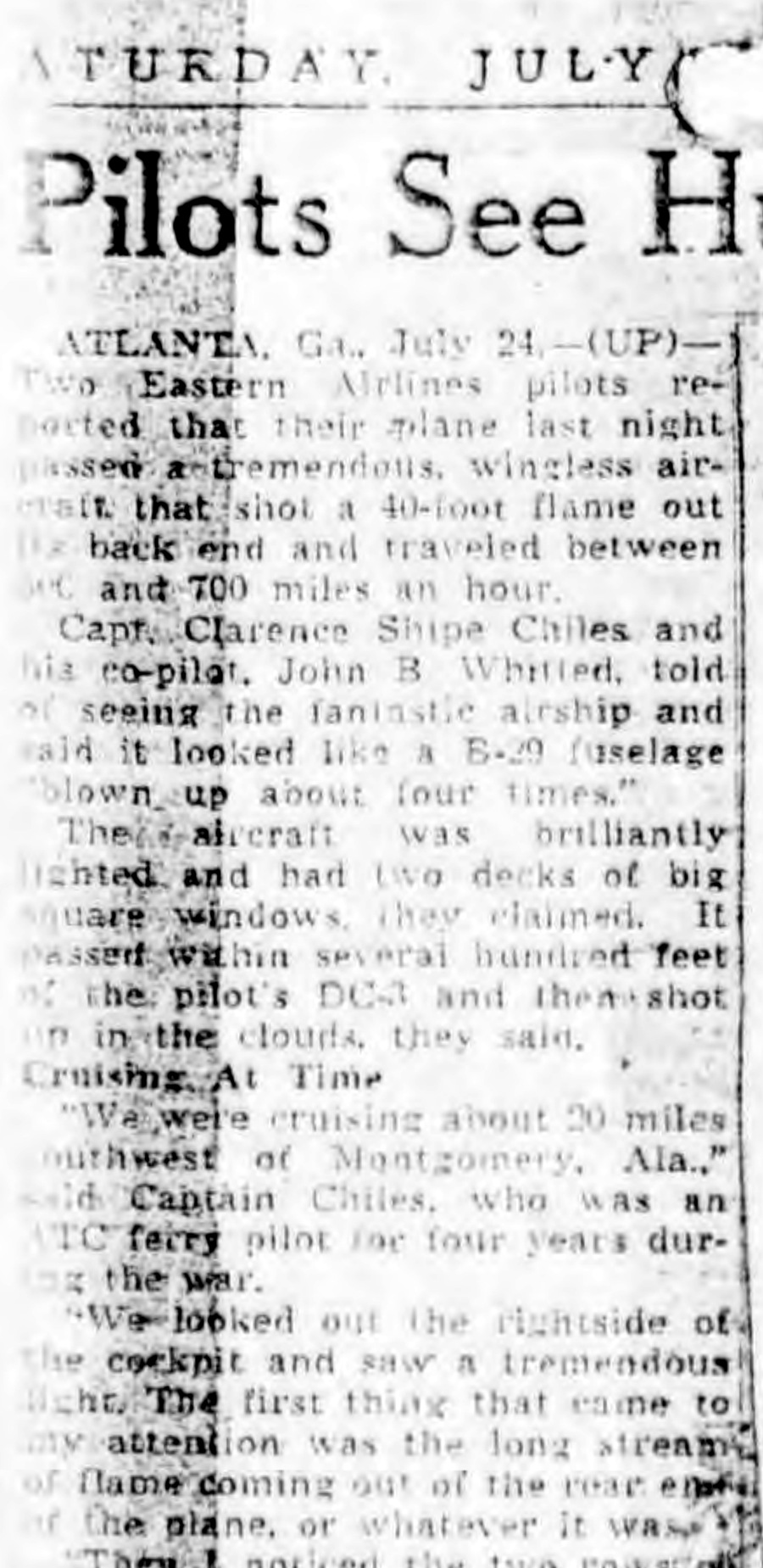 The United Press wire story as it ran on 24 July 1948 under the headline "Pilots See Huge 'Mystery Aircraft' Over South", filed from Atlanta and preserved in the Project Sign file. It carries the pilots' first public description, including Chiles saying the object looked like a B-29 fuselage "blown up about four times" with "two decks of big square windows". The clipping shares its newspaper column with an unrelated wire photo of the Navy's Constitution transport, which is not part of this case (National Archives microfilm via archive.org).