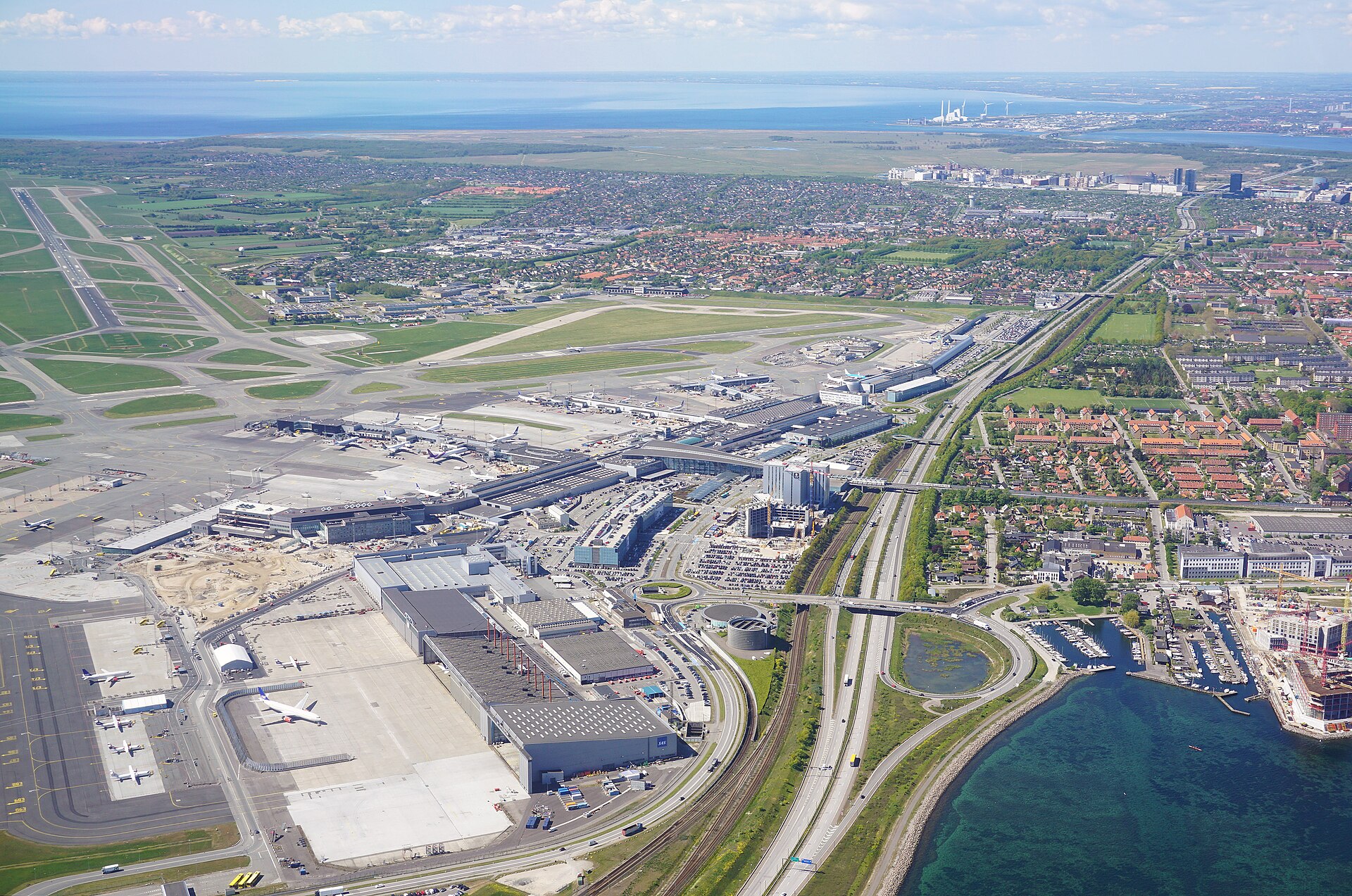 Copenhagen Airport (Kastrup) from the air, the controlled airspace that was shut down on the night of 22 September 2025 after two to three large drones were reported over the field. No clear imagery of the objects themselves exists; the one video that circulated widely was later assessed as most likely a training aircraft.