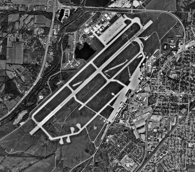 Aerial view of Wright-Patterson Air Force Base, the installation that classified the October 1973 Dayton-area sightings "unofficial" and declined to investigate them. Public-domain USGS aerial photograph, 10 October 2000, shown as a documentary image of the official body, not as a depiction of the reported objects.