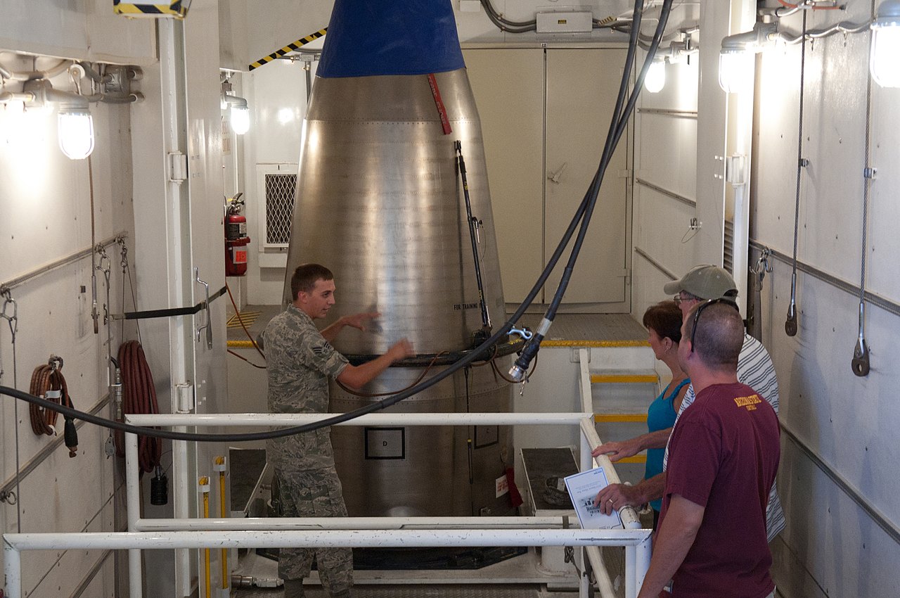 Authentic U.S. Air Force photograph of a Minuteman III missile upper stage being handled at F.E. Warren AFB, Wyoming, the same weapon system and missile field over which the 1976 object was reported. This is a 2012 official base photo used as context, not an image of the object itself; no photograph of the 1976 sighting exists.
