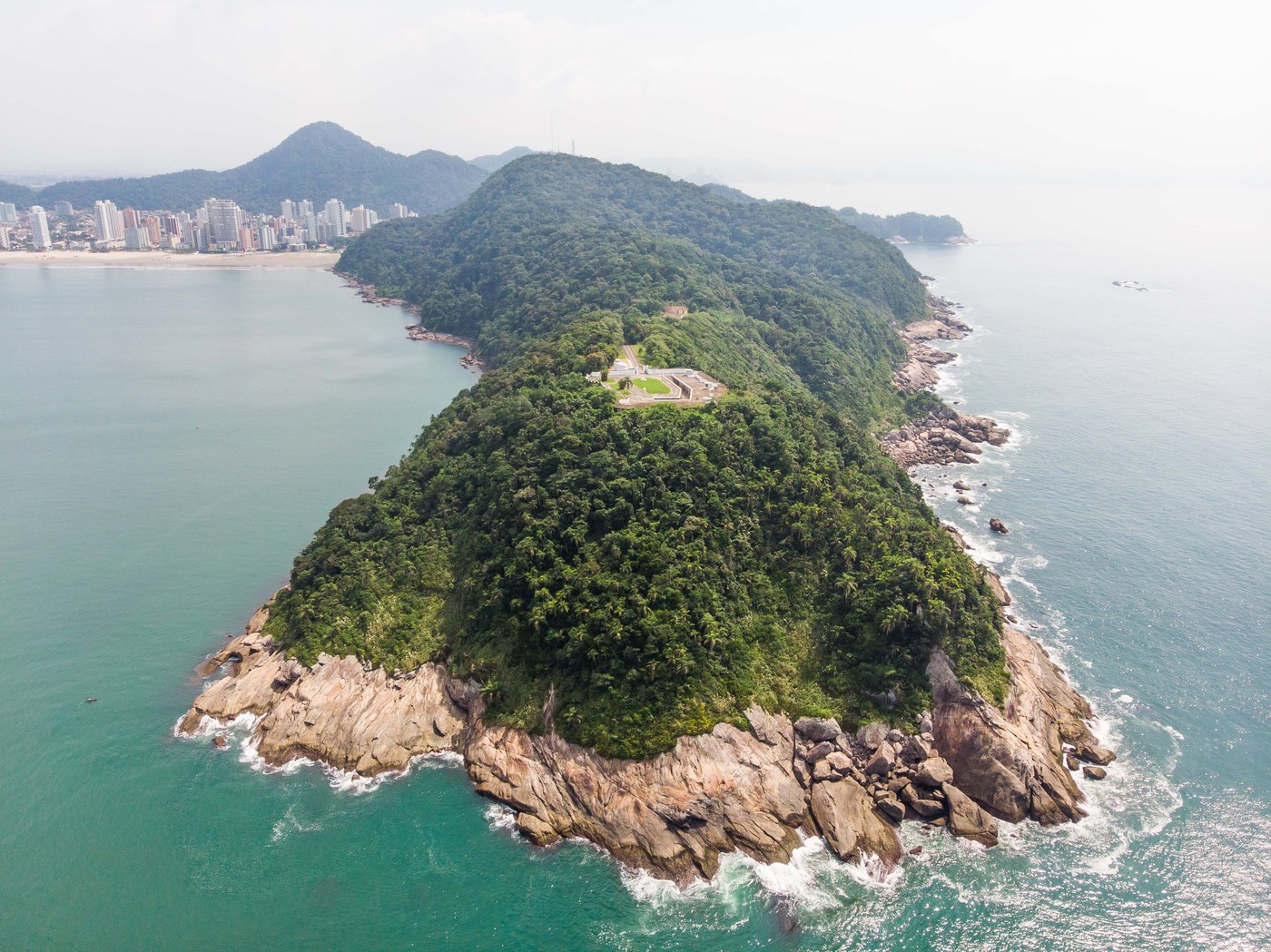 The Forte de Itaipu on the Ponta de Itaipu headland at Praia Grande, São Paulo, the coastal fortress where two sentries were said to be burned by a hovering orange object on the night of 3 to 4 November 1957. No photograph of the object exists; this is an aerial view of the fort today.