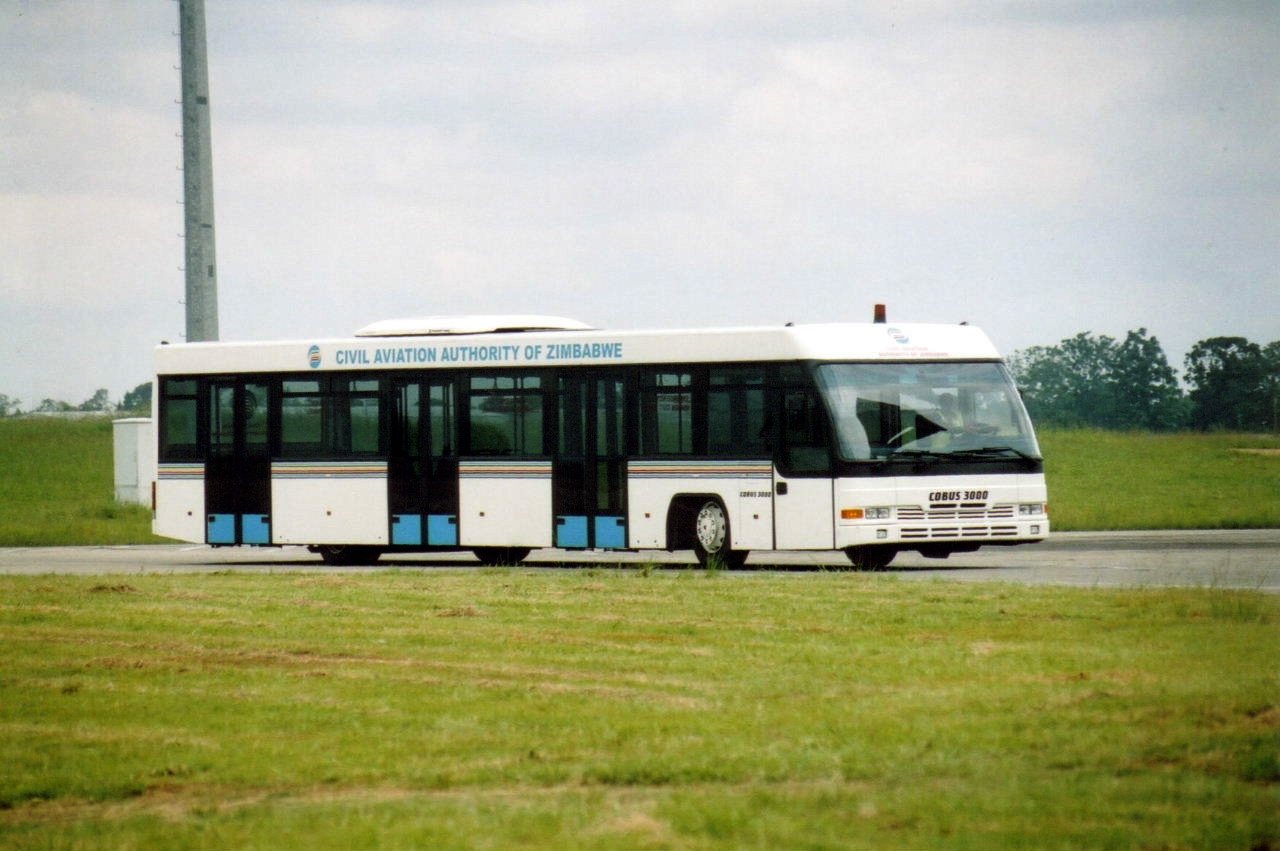 Harare International Airport (now Robert Gabriel Mugabe International), Zimbabwe, over which a declassified CIA cable reported a disc-shaped object on 2 July 2008. No imagery of the object is known to exist; the sole record is the CIA information report released under PURSUE. Shown: a Civil Aviation Authority of Zimbabwe apron bus at the airport.
