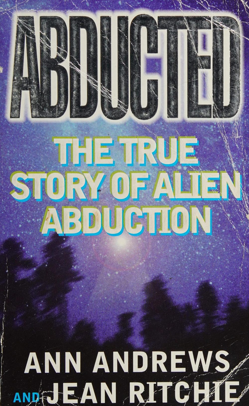 Front cover of "Abducted: The True Story of Alien Abduction" by Ann Andrews and Jean Ritchie (Headline, 1998), the primary published document of the Jason Andrews case. This is a scan of the book cover, not a photograph of any reported event; no photographs of the alleged abductions exist.