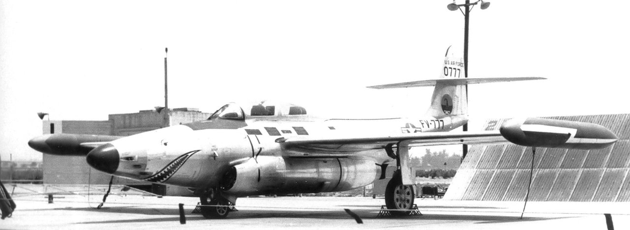 A genuine 1953 United States Air Force photograph of a Northrop F-89C-15-NO Scorpion, serial 50-777, of the 433rd Fighter-Interceptor Squadron stationed at Truax Field, Wisconsin. This is the same squadron and aircraft type as the F-89C, serial 51-5853-A, that First Lieutenant Felix Moncla and Second Lieutenant Robert Wilson flew when they vanished over Lake Superior. It is a photograph of a sister aircraft of the same type and unit, not of the specific Scorpion lost in the incident, which was never recovered.