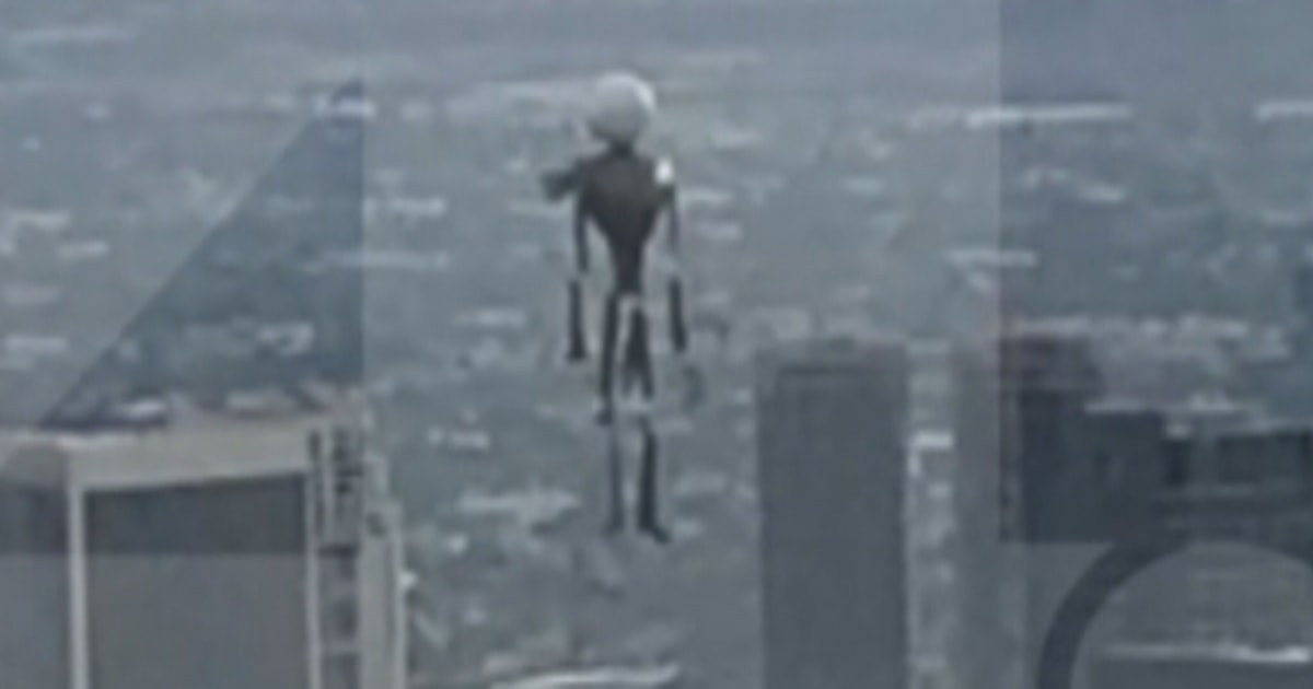 THIS IS NOT THE OBJECT REPORTED IN JUNE 2026. No imagery of the 14 June 2026 wingsuit sighting exists. This is a real frame from Los Angeles Police Department helicopter video shot in early November 2020, showing a human-shaped inflatable balloon floating thousands of feet above the Holmby Hills and Beverly Hills areas. Officials and journalists identified it as a life-sized Jack Skellington airwalker balloon from Tim Burton's 1993 film The Nightmare Before Christmas. The balloon was never recovered and was never linked to any pilot sighting, but it is the physical basis of the FBI and FAA working theory that pilots in this series may have seen balloons.