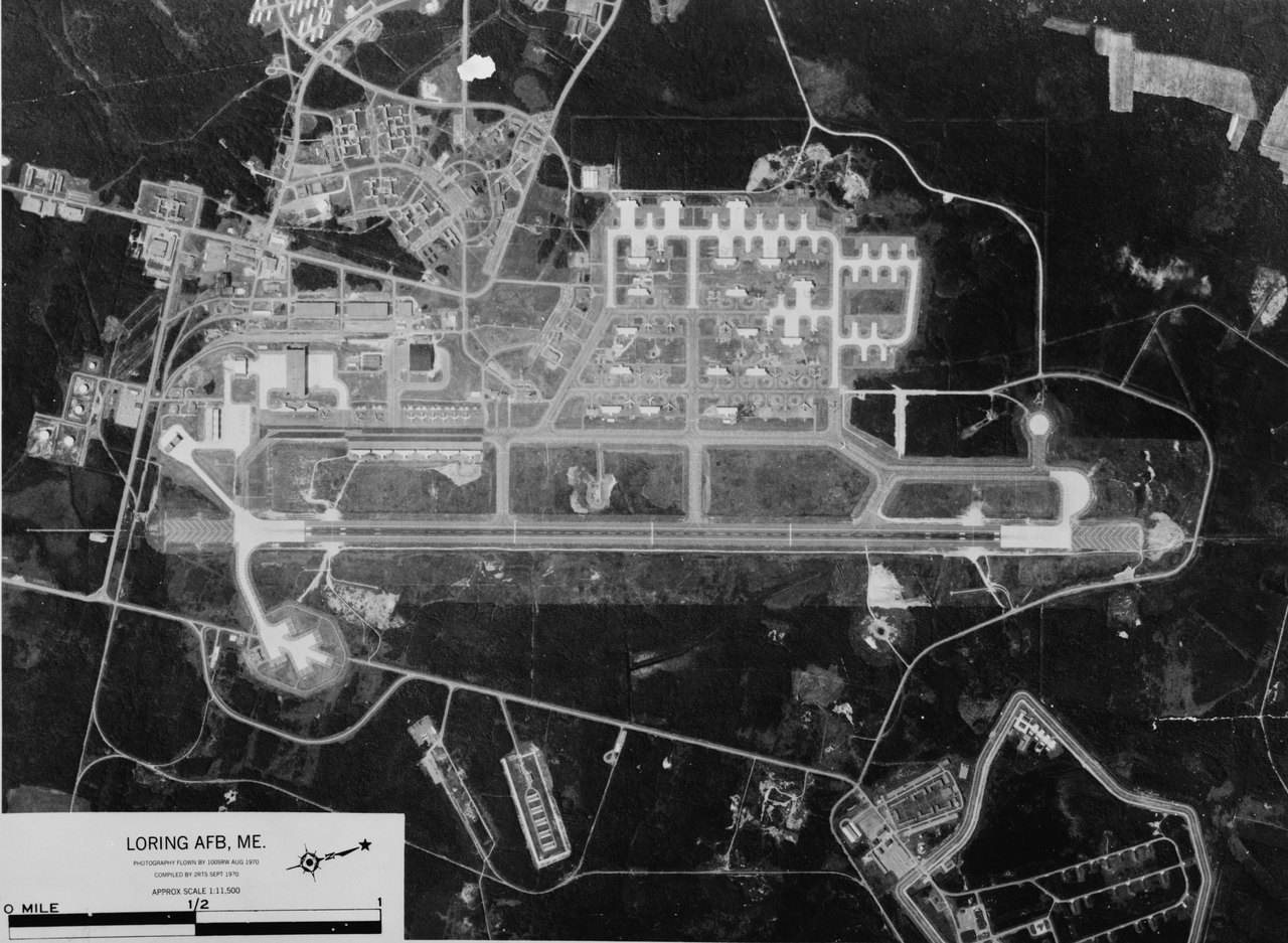 A 1970 United States Air Force aerial photograph of Loring Air Force Base near Limestone, Maine, the Strategic Air Command bomber base whose nuclear weapons storage area was overflown by an unidentified object on the nights of 27 and 28 October 1975. This is a real period photograph of the base, not a depiction of the object.