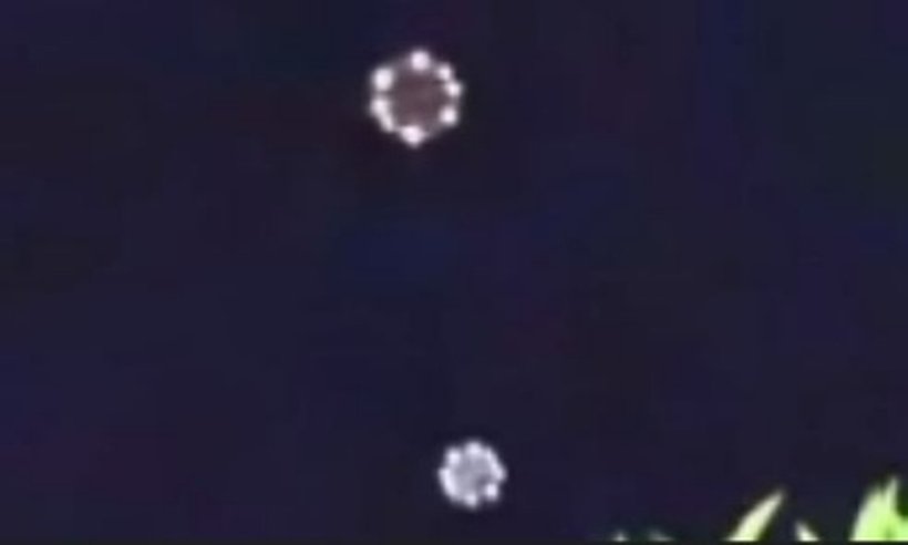 A still frame from the March 2017 Los Angeles video, showing the bright disk or sphere-shaped objects against a plain sky as described in the MUFON photoanalyst's note. This is a genuine frame grab from the witness video, not a render or illustration.