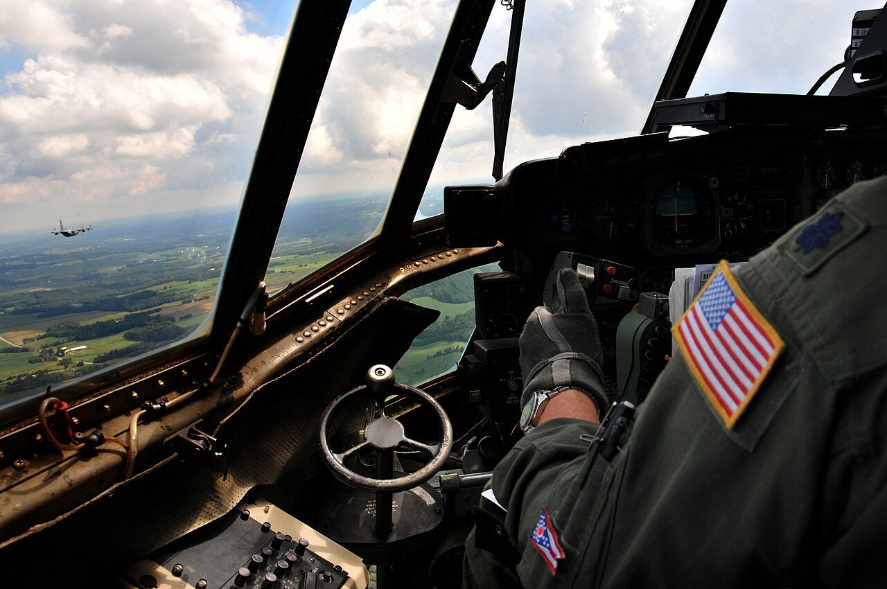 Official US Air National Guard photograph of a 179th Airlift Wing C-130H Hercules in flight over Mansfield, Ohio. This is the same unit and aircraft type that independent analysts identified as the cause of the Marion lights: the 179th was flying C-130H Hercules out of Mansfield Lahm until July 2022. This is a documentary photo of the candidate object, not a still from the Marion video.