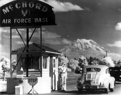 The main gate sign of McChord Air Force Base, Pierce County, Washington. This is a real United States Air Force photograph of the actual base, used to identify the location. It is not an image of the claimed 1972 event, for which no authenticated photograph or document exists.