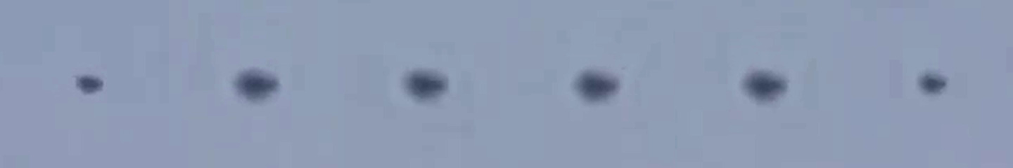 The descent, one panel per second from 7 to 12 seconds, each panel centred on the object. Over this window the object falls 291 pixels and drifts 50 pixels left while phase correlation measures the camera shift as zero in both axes, with the correlation lock improving when the object is masked out of the calculation. The object was moving steadily downward, which is the opposite of the stillness on which the viral reading of this footage was built.