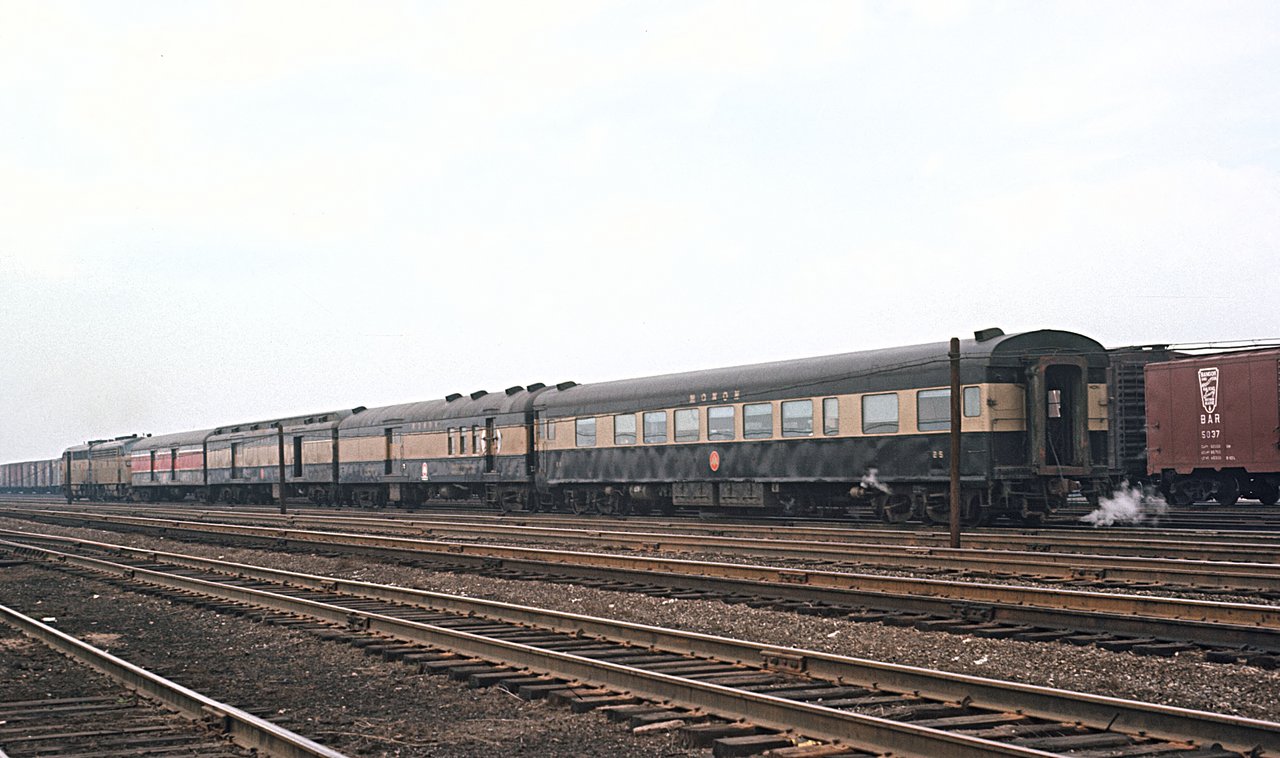 A real period photograph of a Monon Railroad EMD F3A diesel locomotive (unit 208) pulling a train at South Chicago, Illinois, June 1965. This is a stand-in for the actual encounter, of which no photographs exist; it shows the same railroad and the same class of diesel power the No. 91 crew was running on the night of 3 October 1958. It is not an image of the objects reported.