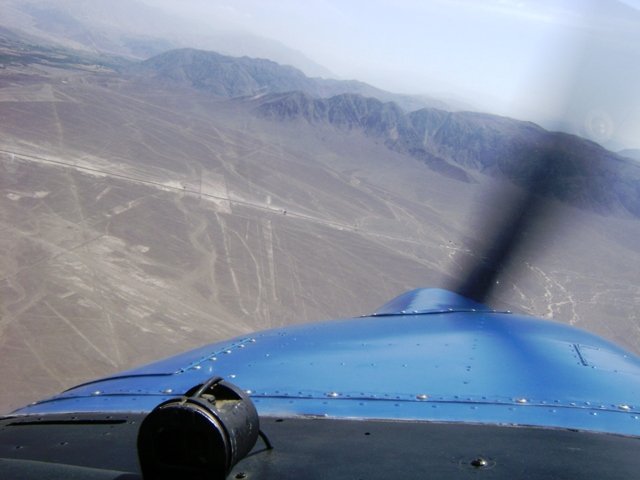 A real photograph of the Nazca desert plain in southern Peru, the arid pampa landscape of the kind where the alleged 1972 disc landing was reported at Pampa Carbonera south of Nazca. This is a photograph of the location setting, not of the event. No photograph of the reported craft or occupant exists; the case survives only as a written narrative.