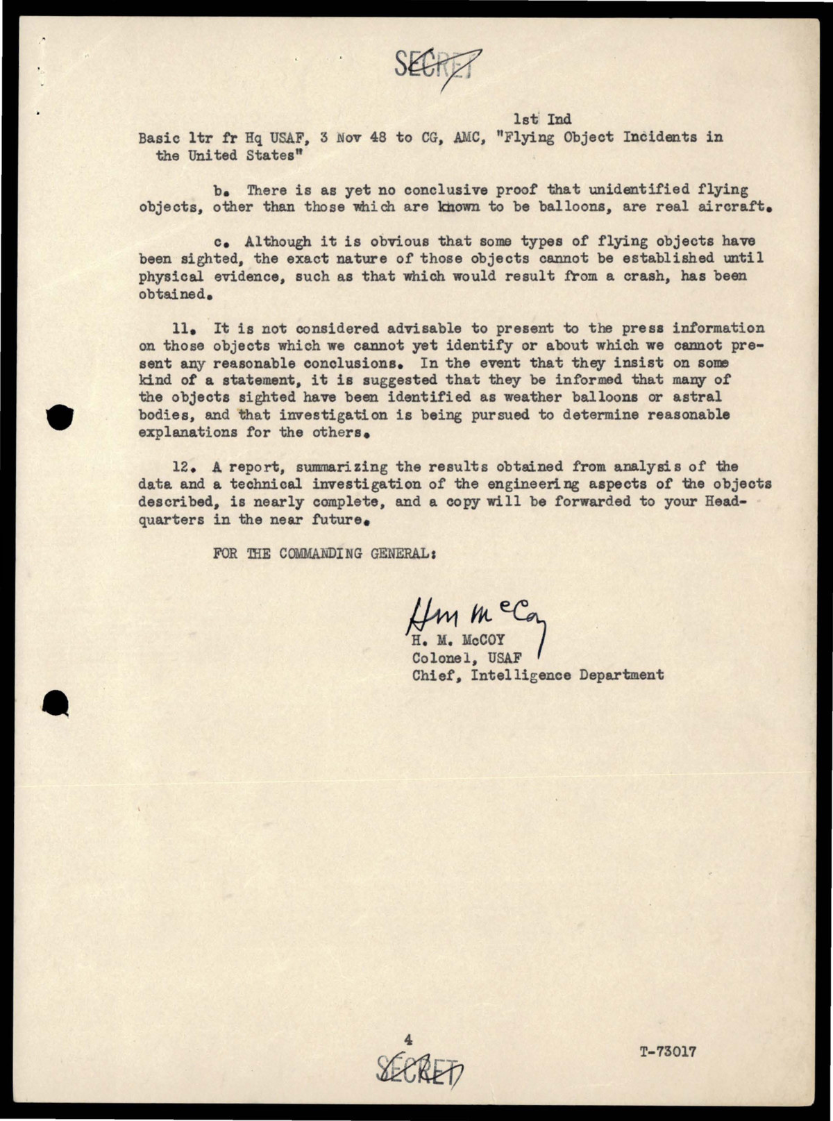 The closing page, signed by Colonel H. M. McCoy, Chief of the Intelligence Department at Air Materiel Command. Paragraph 11 advises against telling the press about objects that could not be identified, and suggests that any statement point to weather balloons and astral bodies.