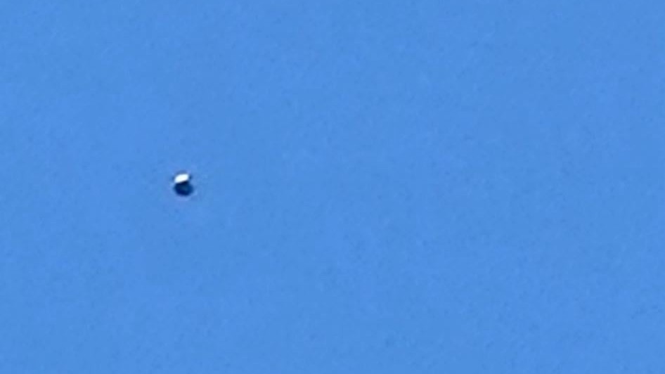 One of the two metallic spheres over Robinson Township, Pennsylvania, 30 June 2026. Witness photograph.