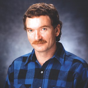 Travis Walton, the Arizona logger who says he was struck by a beam from a hovering disc at Turkey Springs on November 5, 1975 and vanished for five days. Portrait used on the McMenamins UFO Festival speaker page.