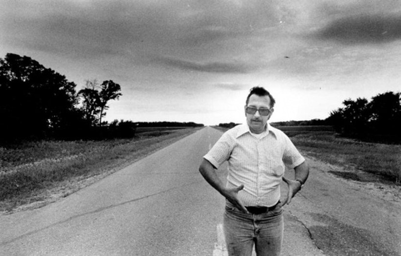 Deputy sheriff Val Johnson photographed at the scene on County Road 5 in Marshall County, Minnesota, after his 27 August 1979 collision with an unidentified force or object. A real contemporary press photograph, not a recreation.